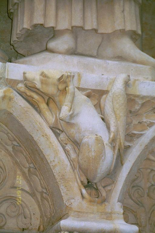 Dog and Bird at the foot of the Saints